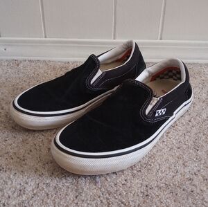 Vans Black and White Slip-on Sneakers
